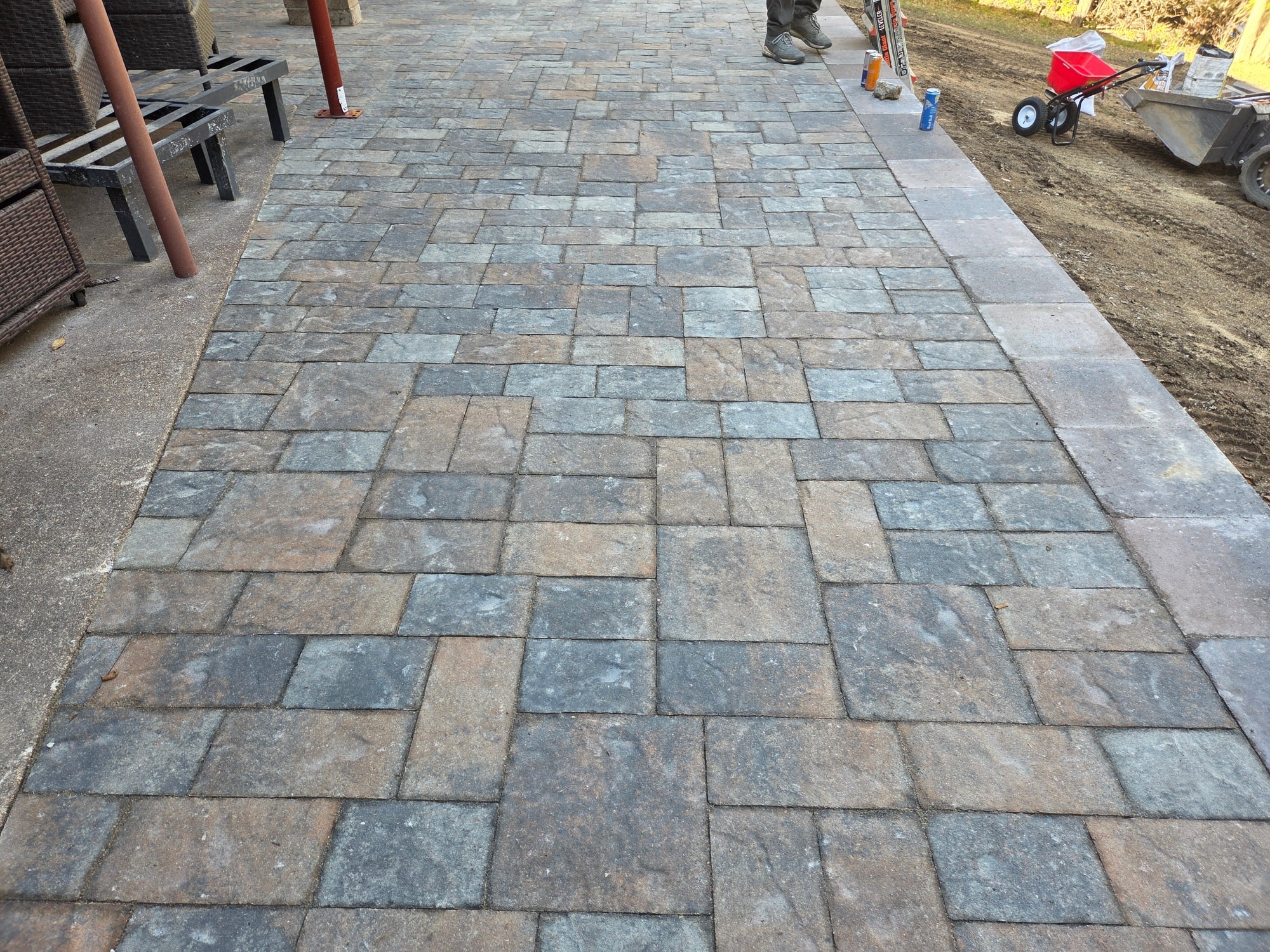 Custom paver patio installation Springfield MO - outdoor living hardscape design by Maxwell